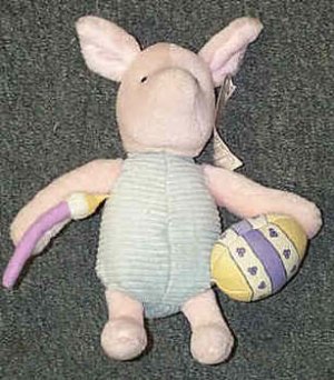 Piglet plush with an Easter egg